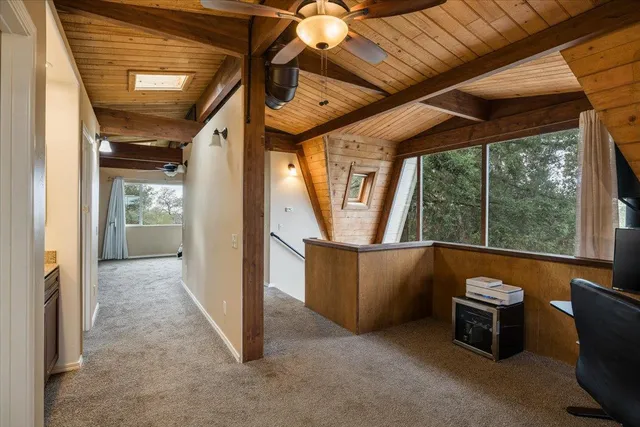 a en suite bathroom with a double vanity sink and mirror with shower