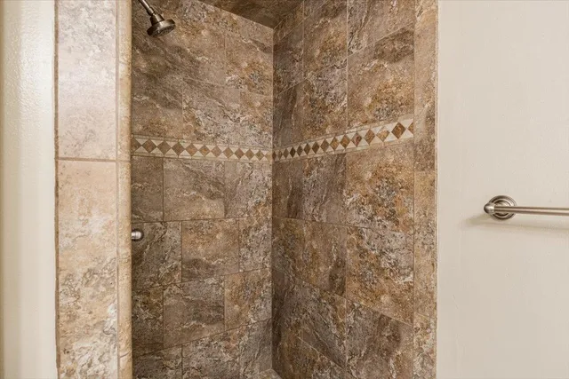 a view of staircase with white walls