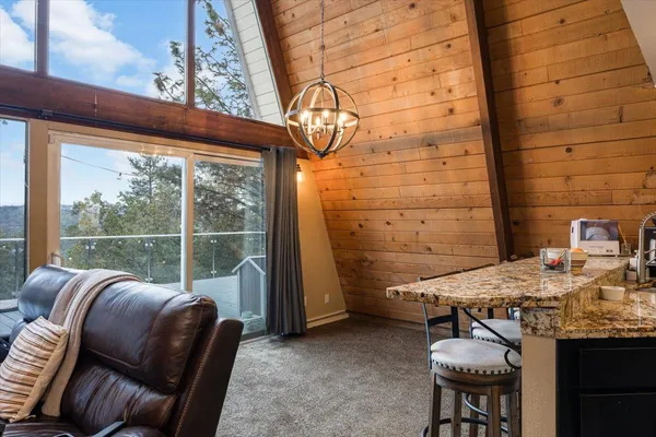 a view of balcony with furniture