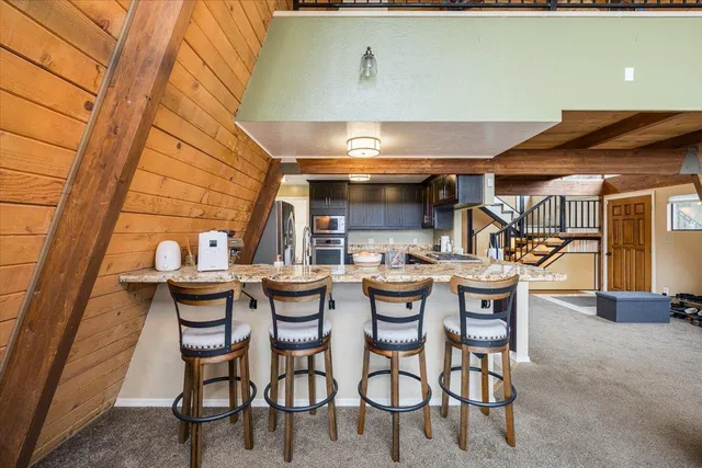 a dining room with furniture and a table
