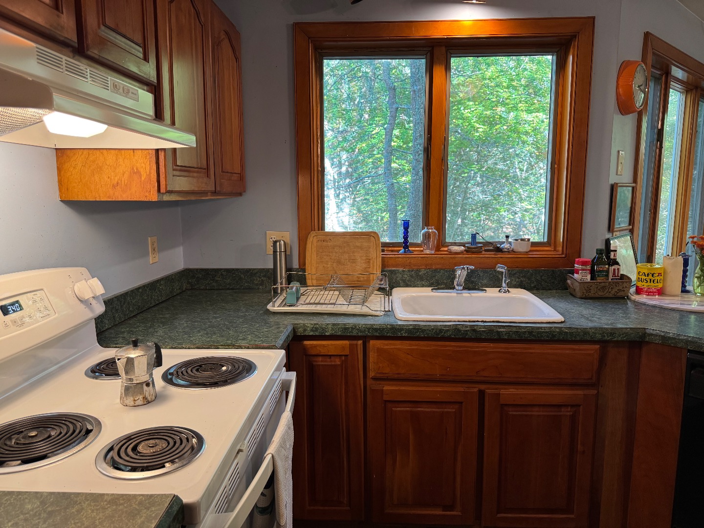 20 Brook Hollow Road West Tisbury, MA 02568 - Photo 19 of 33 a kitchen with a stove a sink and a refrigerator