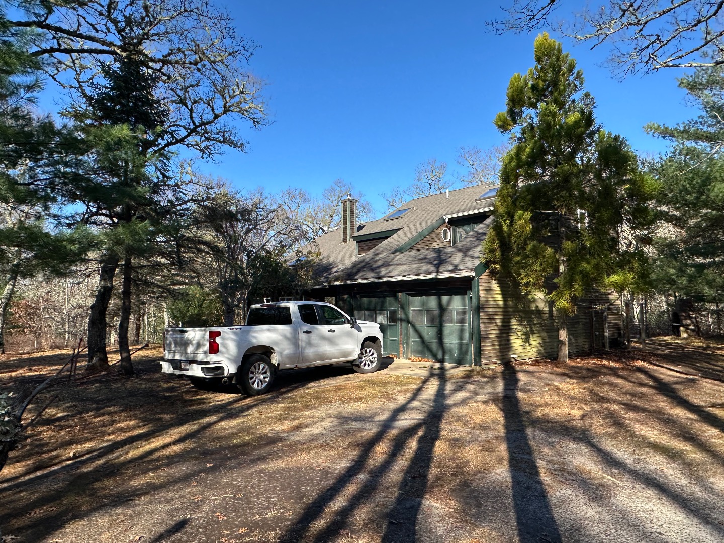 20 Brook Hollow Road West Tisbury, MA 02568 - Photo 6 of 33 a car parked on the side of a street