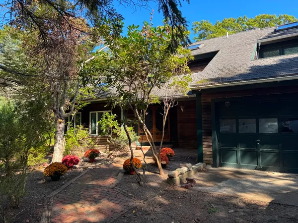 an outdoor space with patio furniture