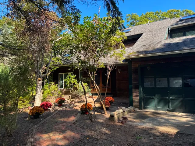 an outdoor space with patio furniture