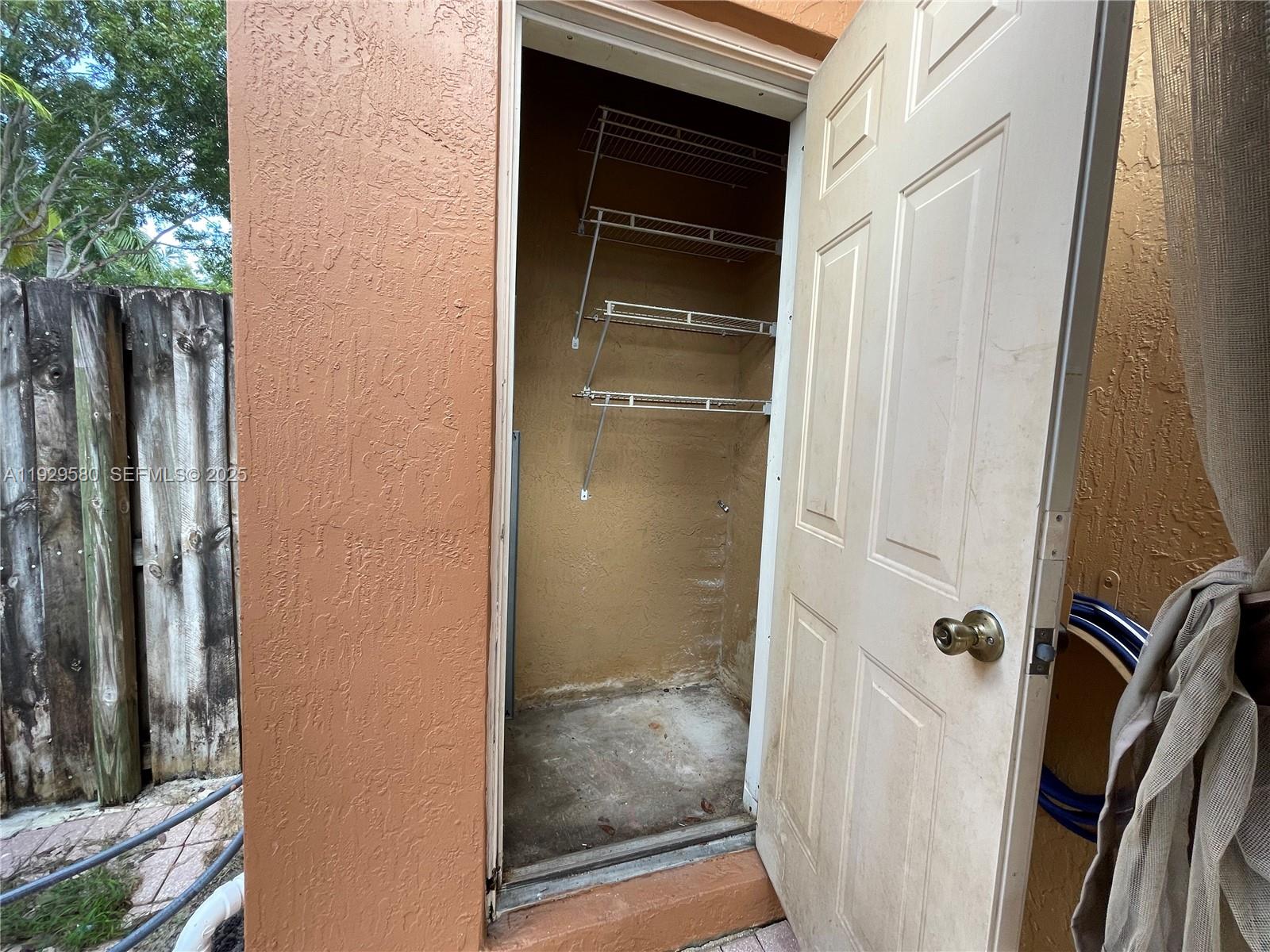 8507 Northwest 140th Terrace, Unit 801 Miami Lakes, FL 33016 - Photo 18 of 42 a bathroom with a shower
