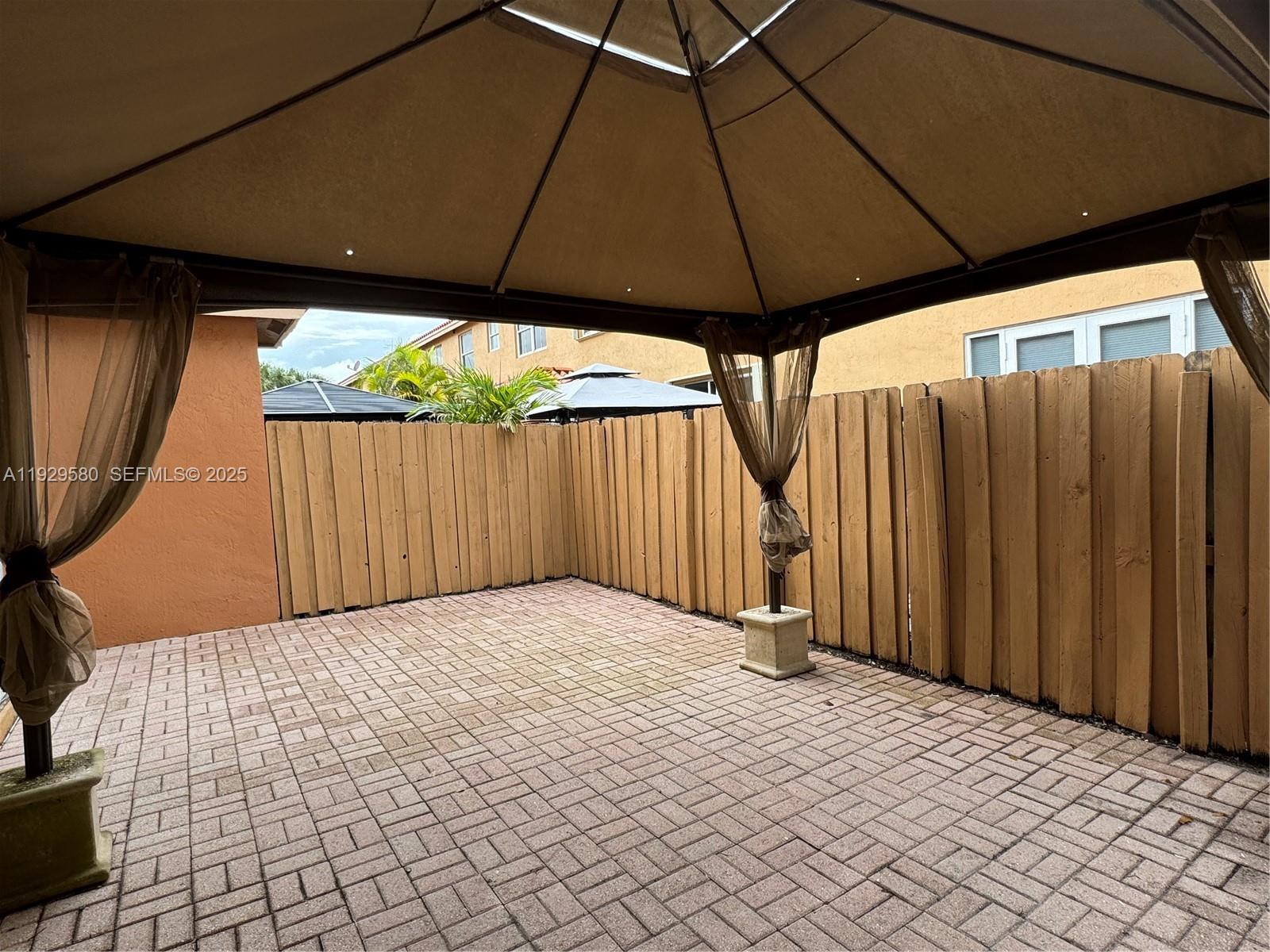 8507 Northwest 140th Terrace, Unit 801 Miami Lakes, FL 33016 - Photo 23 of 42 a view of backyard with backyard