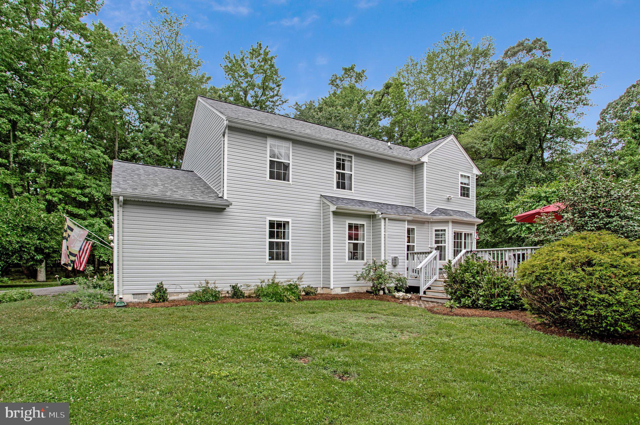1582 Snug Harbor Road Shady Side, MD 20764 - Photo 8 of 53 Charming home nestled in lush greenery.