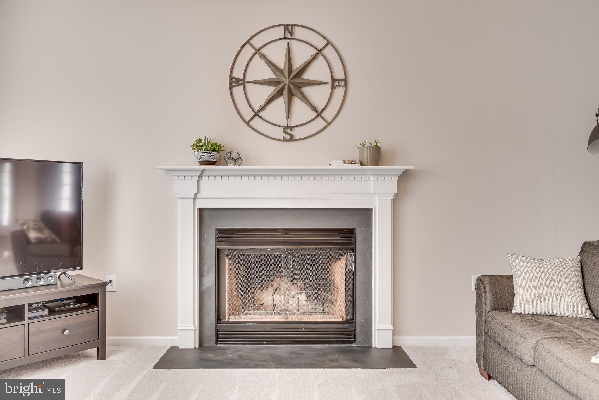 1214 Stallion Street Ranson, WV 25438 - Photo 18 of 67 The fireplace creates a natural focal point