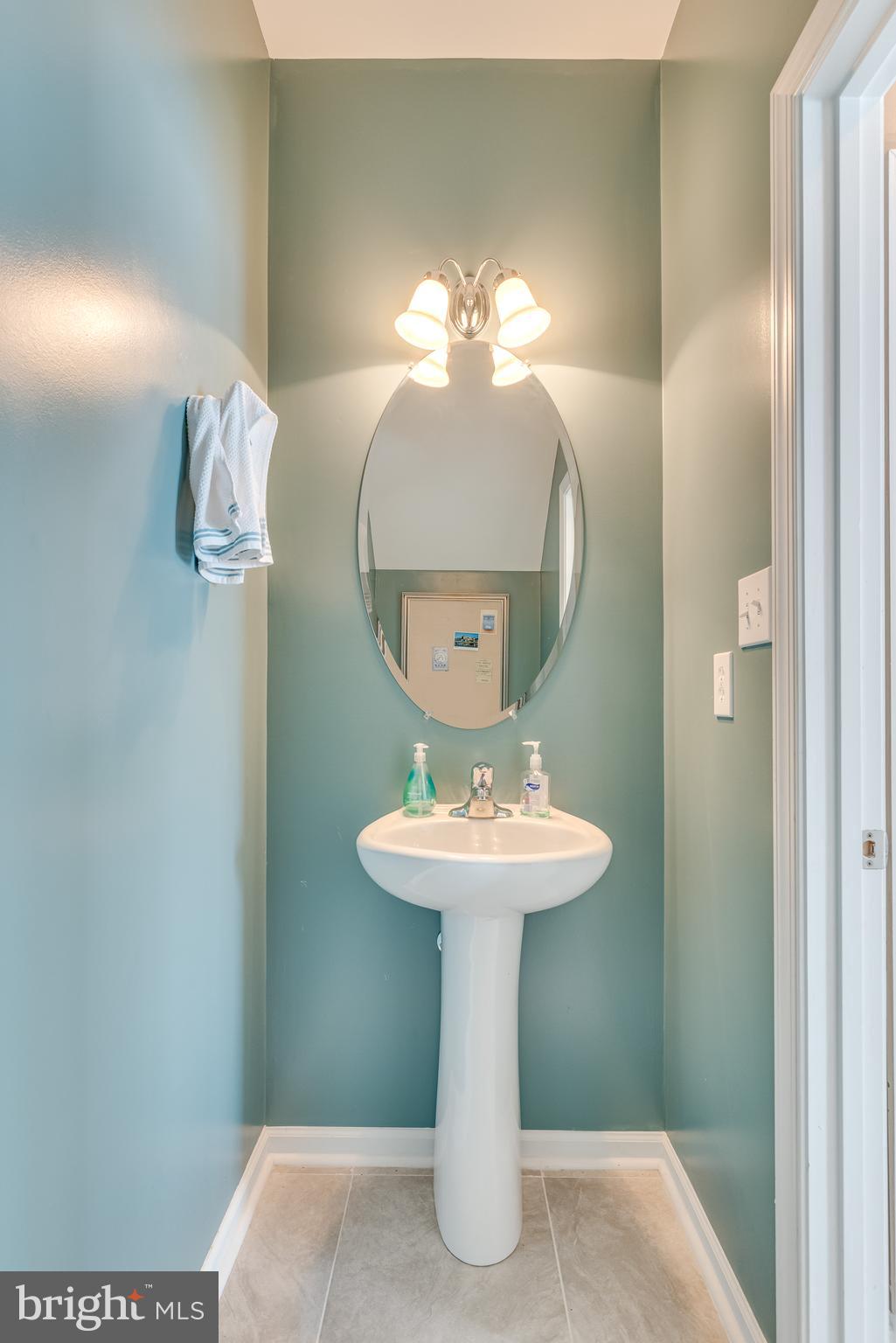 1214 Stallion Street Ranson, WV 25438 - Photo 34 of 67 Main level half bath with elegant pedestal sink