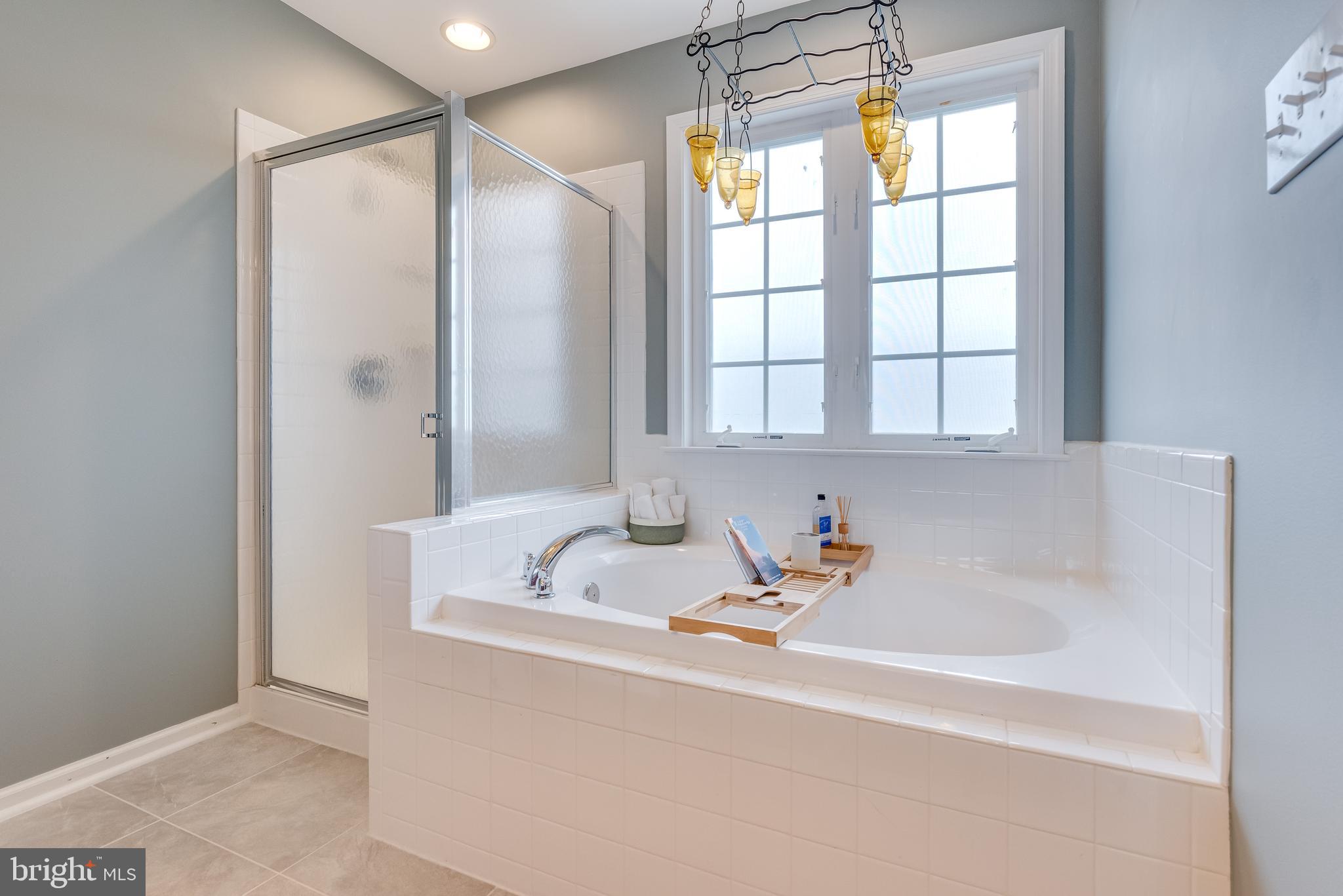 1214 Stallion Street Ranson, WV 25438 - Photo 49 of 67 Walk-in shower and soaking tub w/ tile surround