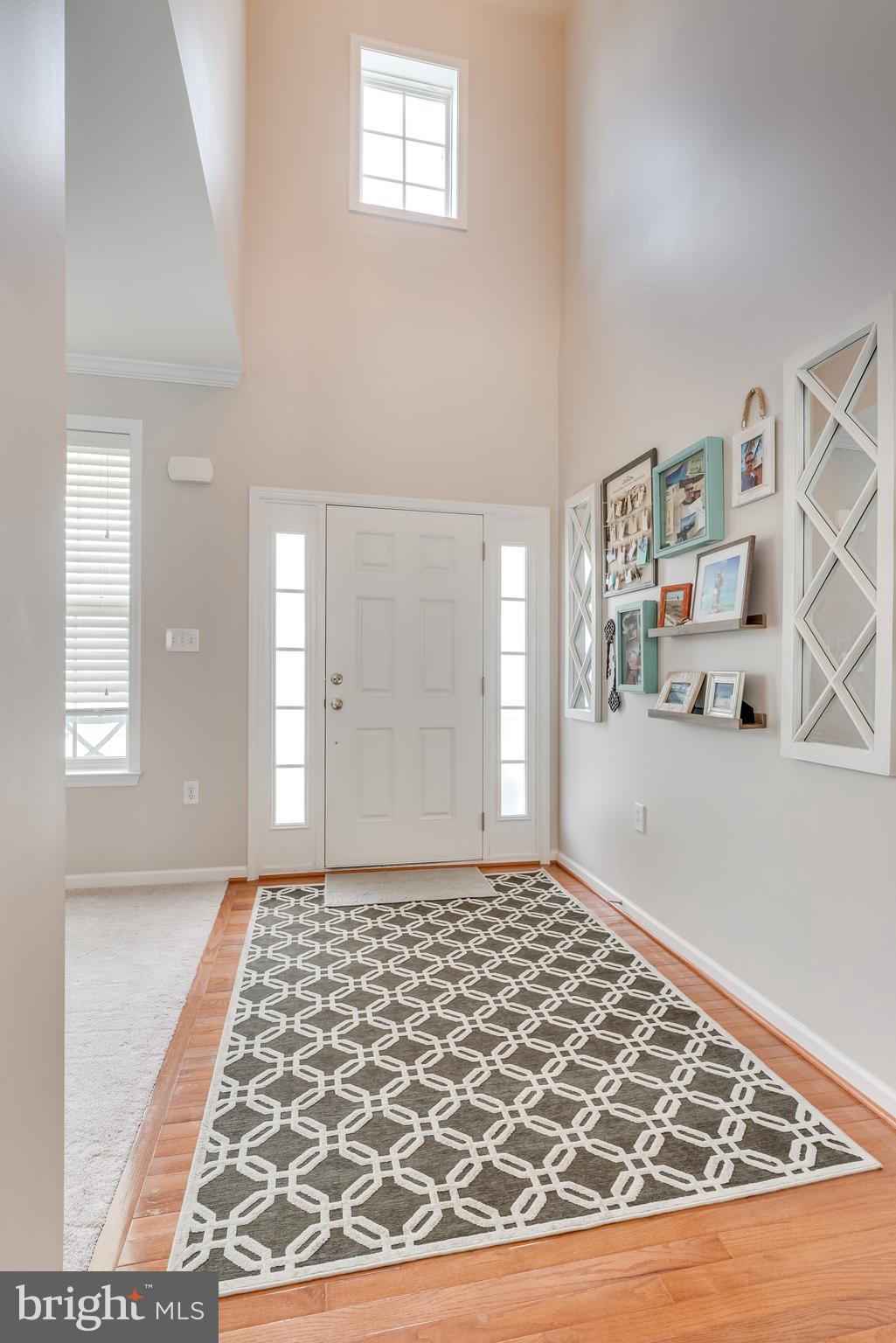 1214 Stallion Street Ranson, WV 25438 - Photo 8 of 67 Two story ceilings add grandeur to the space