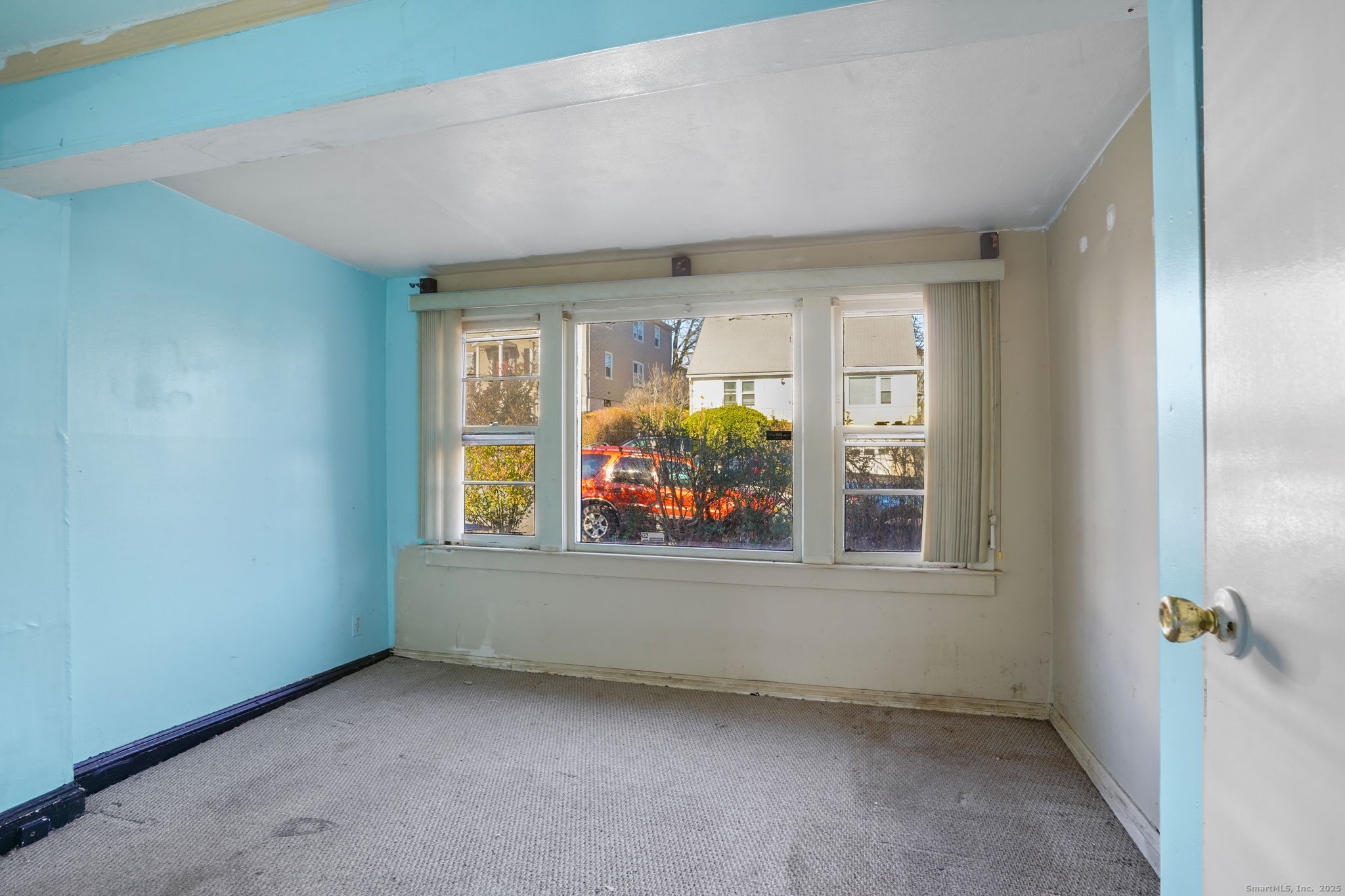 73 Carlson Avenue Bridgeport, CT 06606 - Photo 15 of 29 an empty room with window