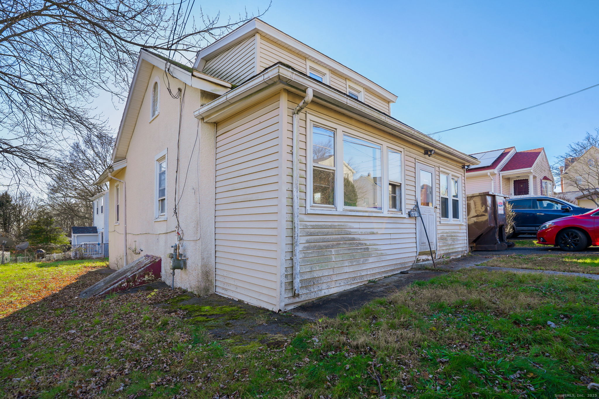 73 Carlson Avenue Bridgeport, CT 06606 - Photo 26 of 29 a view of a house with a yard