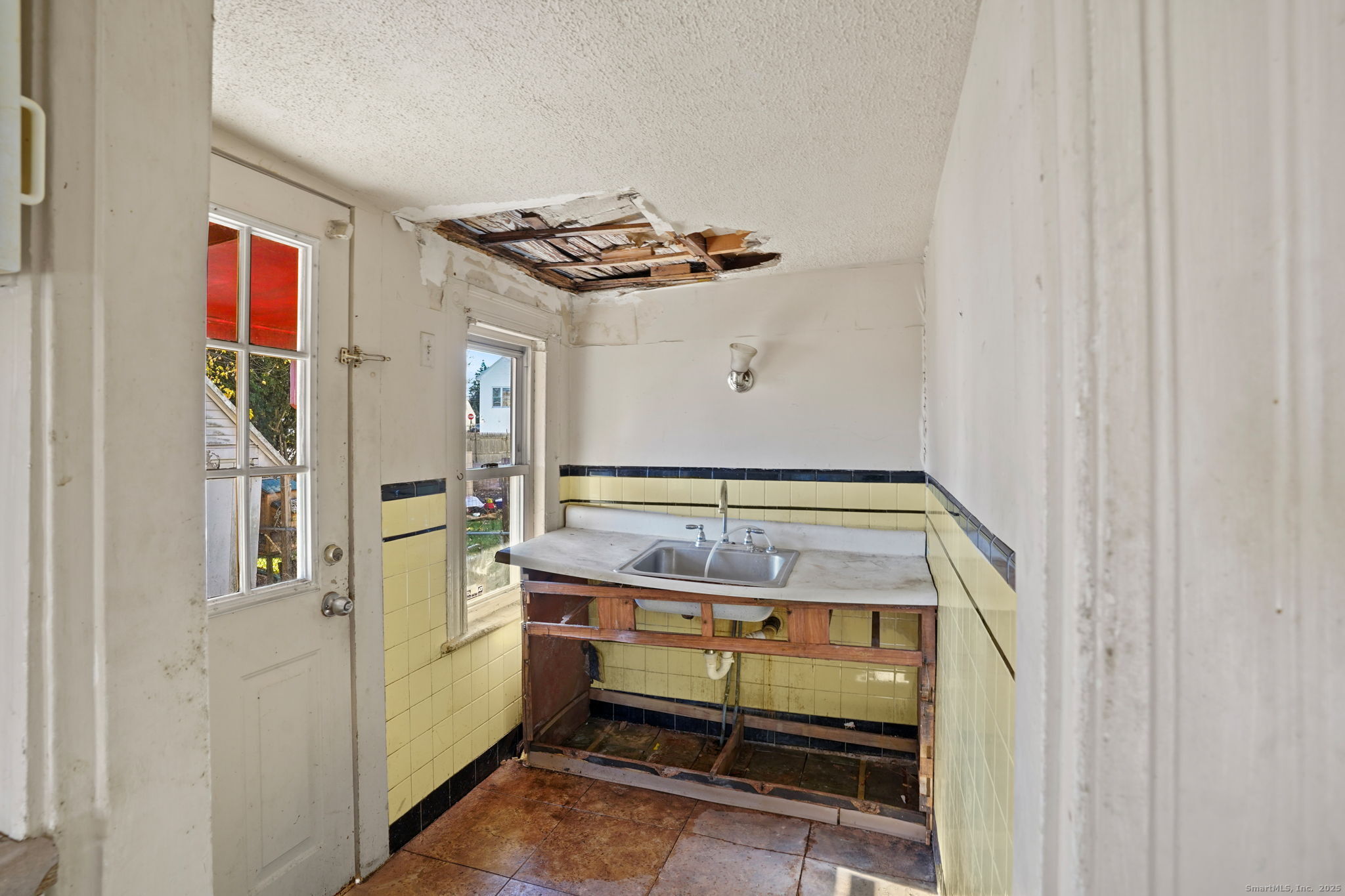 73 Carlson Avenue Bridgeport, CT 06606 - Photo 7 of 29 a room with storage and utility