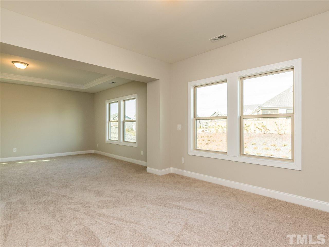 1809 Capstone Drive Durham, NC 27713 - Photo 18 of 25 a view of an empty room with a window