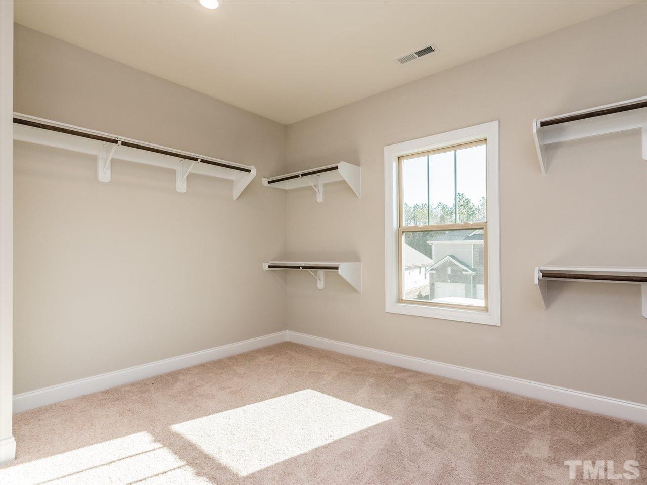 1809 Capstone Drive Durham, NC 27713 - Photo 21 of 25 a view of an empty room with a window