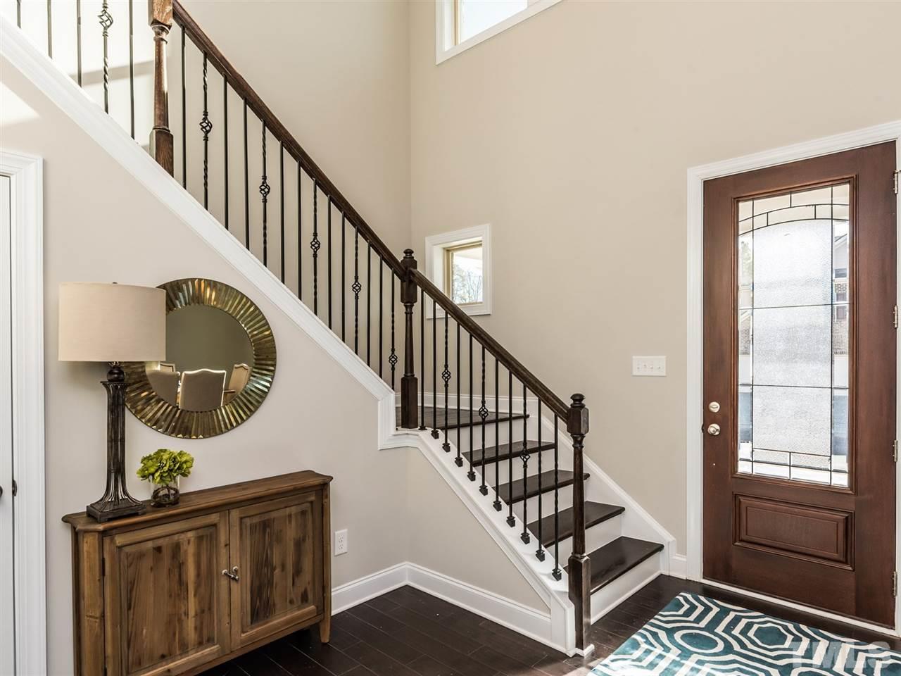 1809 Capstone Drive Durham, NC 27713 - Photo 4 of 25 a view of entryway and hall with wooden floor