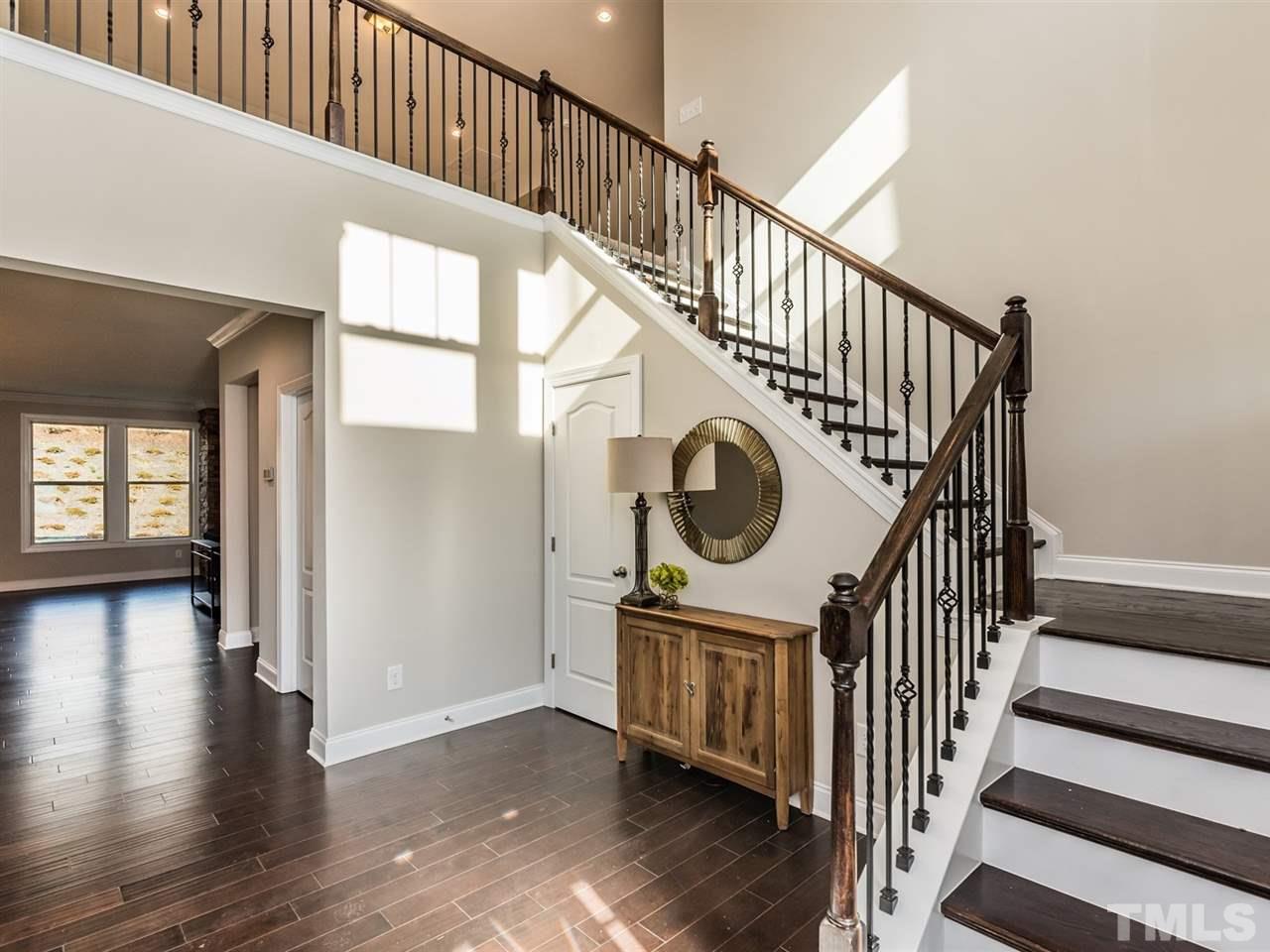 1809 Capstone Drive Durham, NC 27713 - Photo 5 of 25 a view of entryway and hall with wooden floor