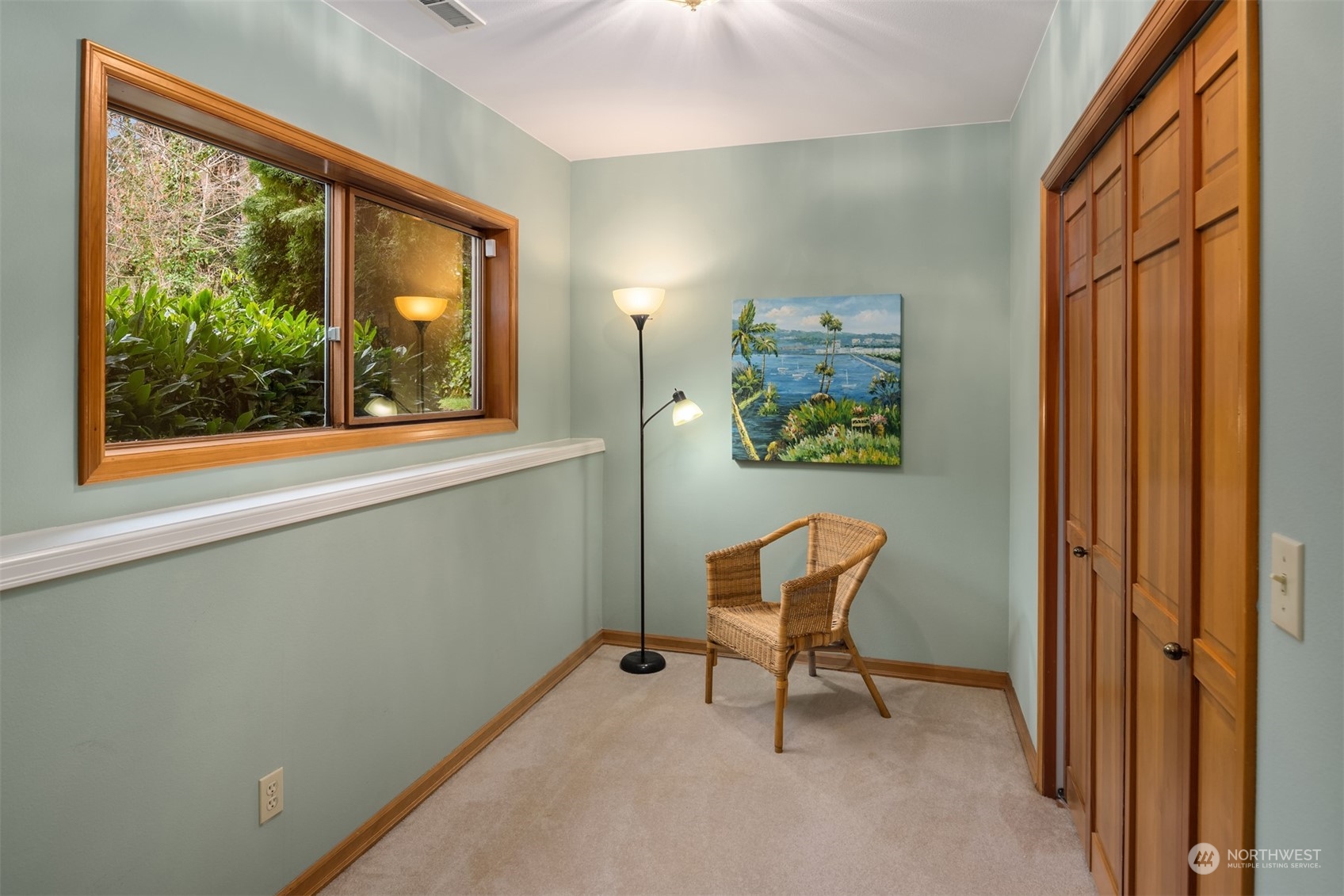 21121 50th Drive Southeast Bothell, WA 98021 - Photo 25 of 38 a view of a hallway with chairs and a window