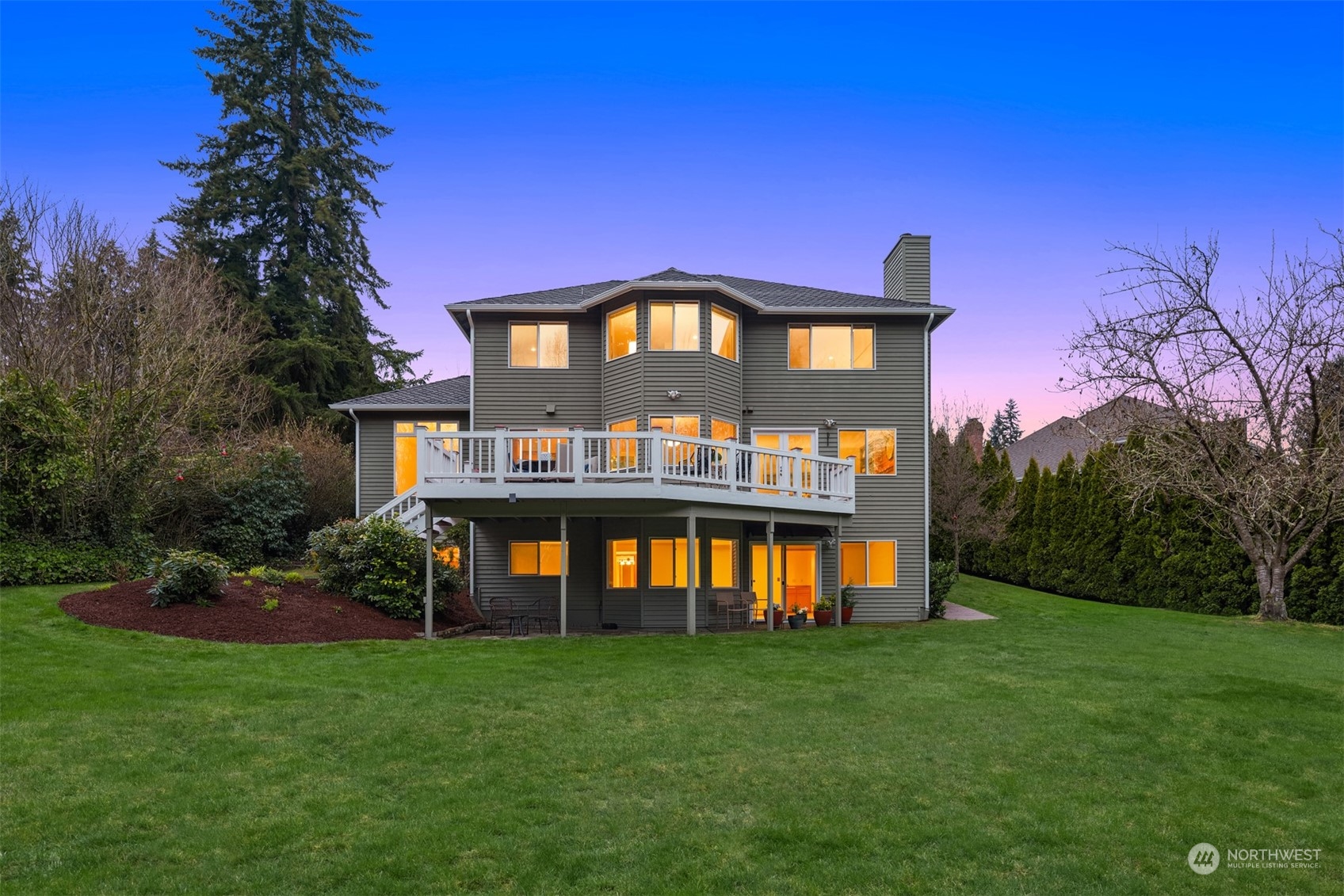 21121 50th Drive Southeast Bothell, WA 98021 - Photo 30 of 38 a front view of a house with a yard