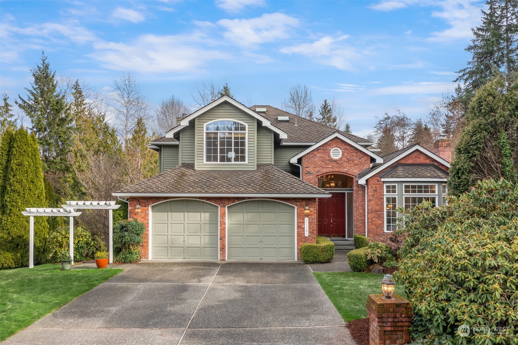 21121 50th Drive Southeast Bothell, WA 98021 - Photo 38 of 38 a front view of a house with a garden