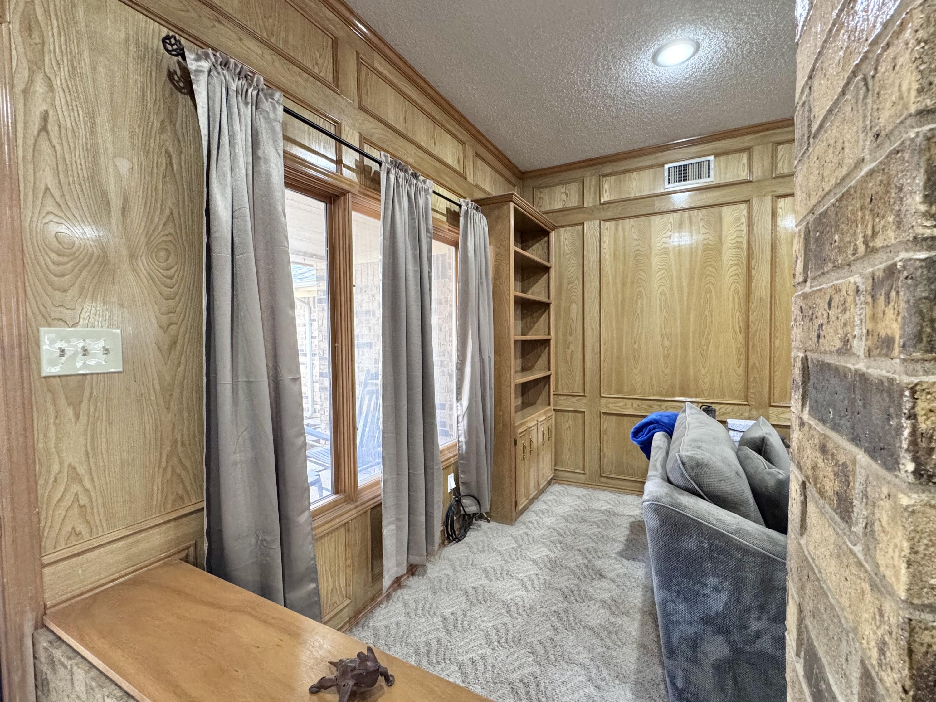 5617 87th Street Lubbock, TX 79424 - Photo 8 of 22 a bedroom with a bed and a window