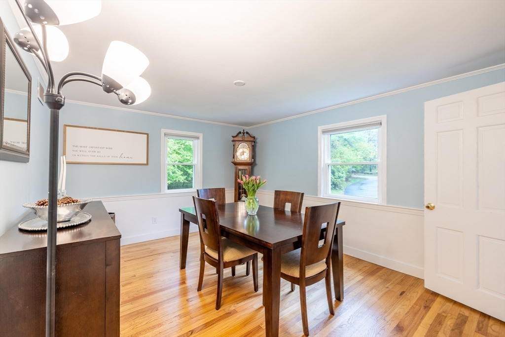 26 Roundtop Road Boxford, MA 01921 - Photo 18 of 42 a view of a dining room with furniture window and wooden floor