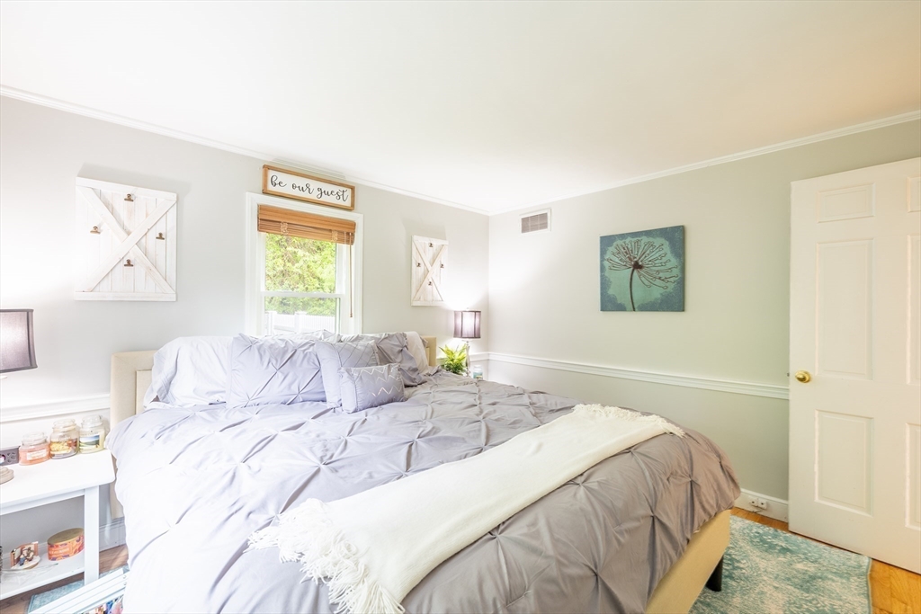 26 Roundtop Road Boxford, MA 01921 - Photo 20 of 42 a bedroom with a bed and a window