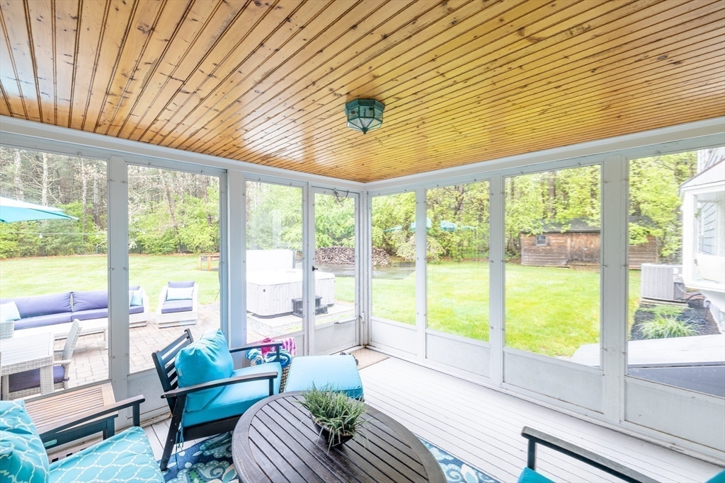 26 Roundtop Road Boxford, MA 01921 - Photo 24 of 42 a living room with furniture and floor to ceiling windows