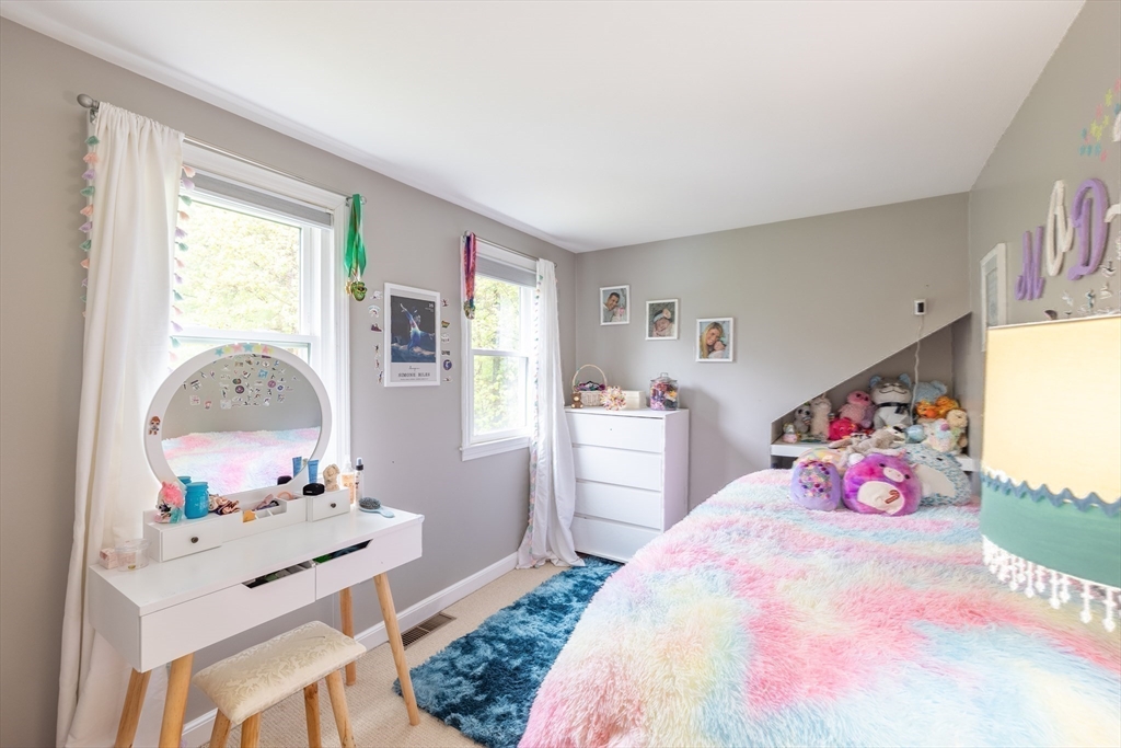 26 Roundtop Road Boxford, MA 01921 - Photo 32 of 42 a bedroom with a bed and a dresser