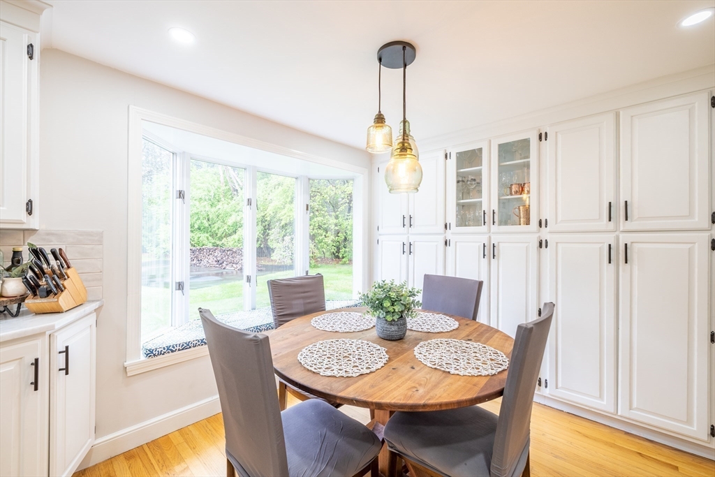 26 Roundtop Road Boxford, MA 01921 - Photo 10 of 42 a view of a dining room with furniture window and wooden floor