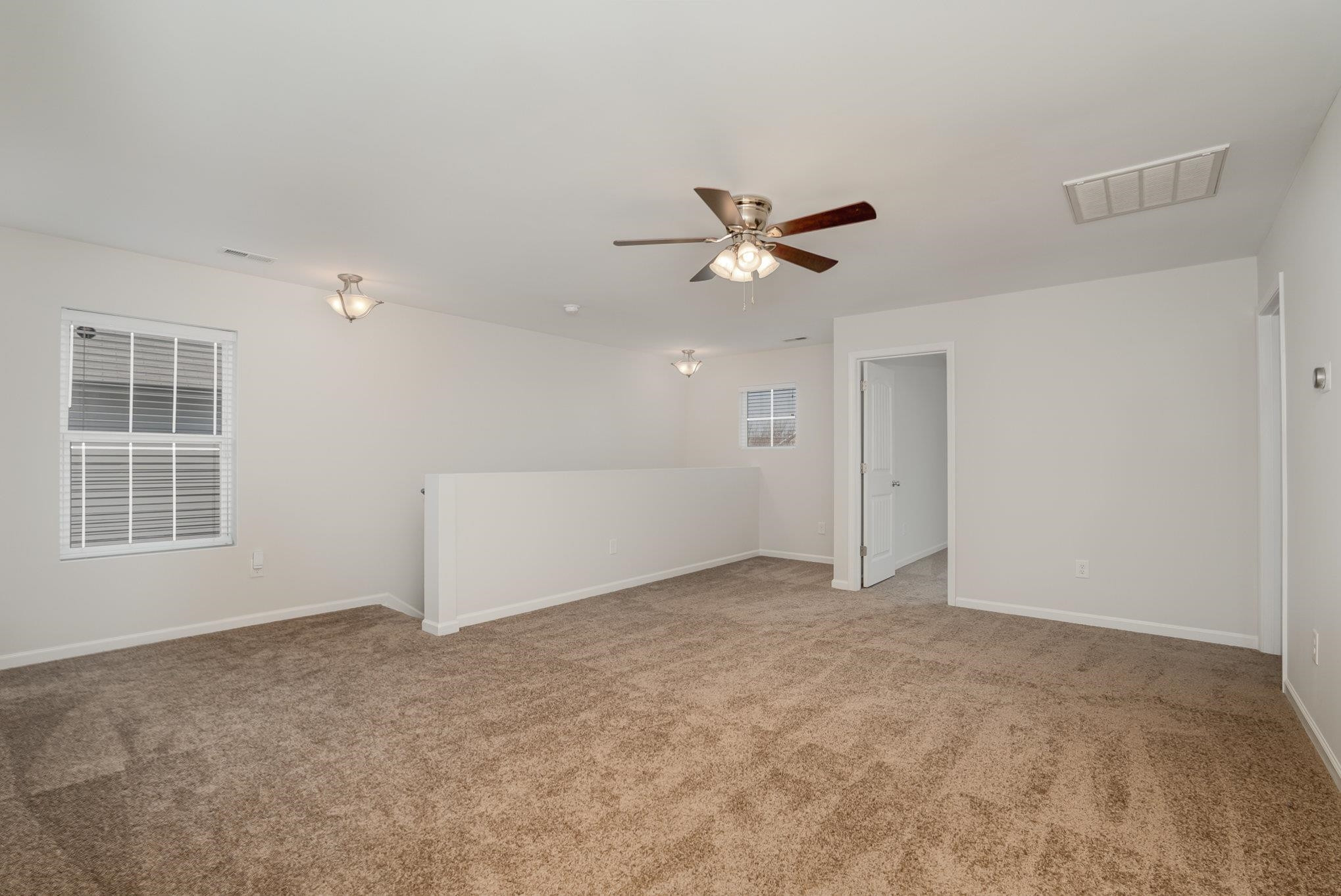 4364 Lyman Avenue Raleigh, NC 27616 - Photo 15 of 28 a view of an empty room with a window
