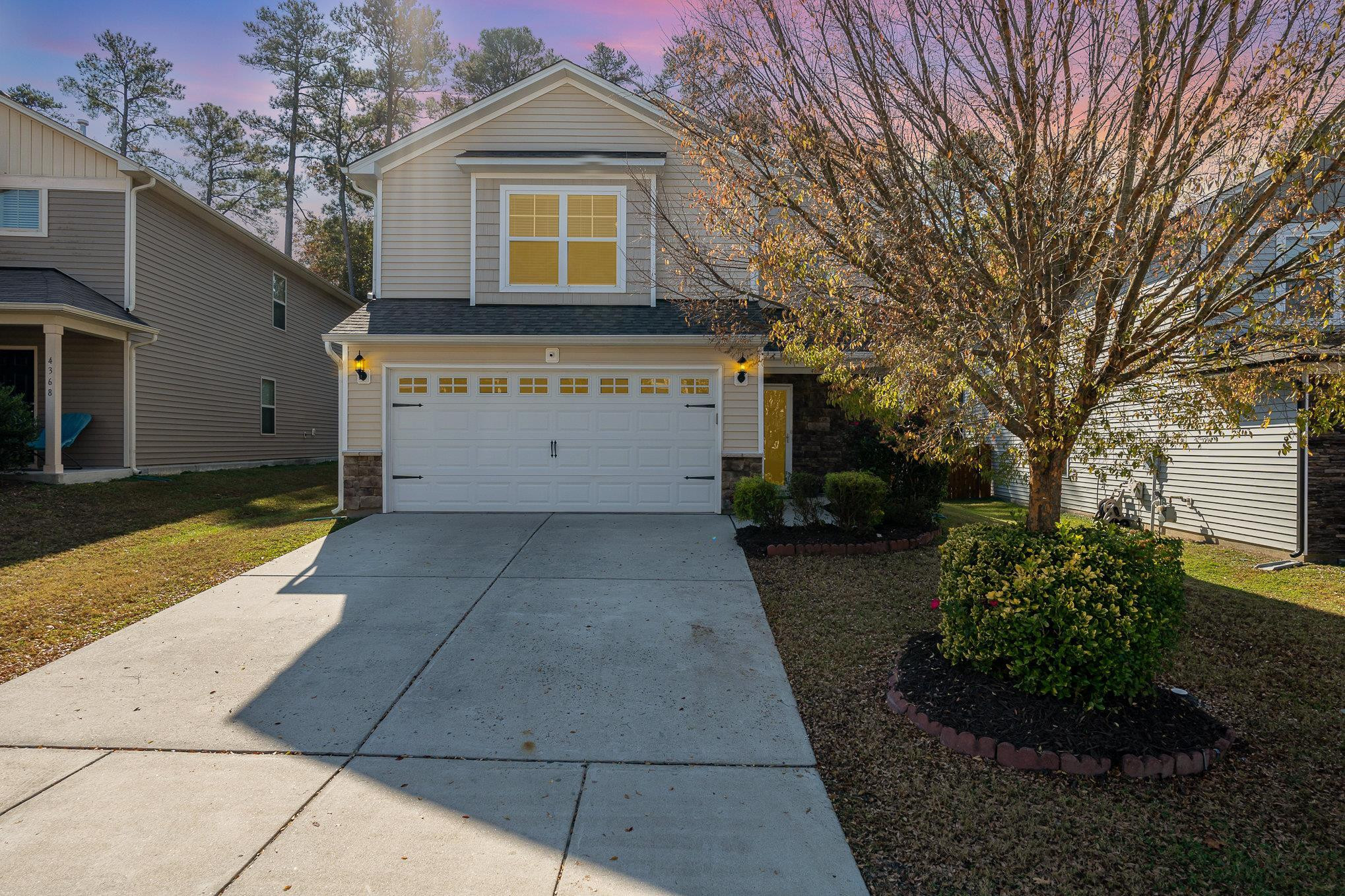 4364 Lyman Avenue Raleigh, NC 27616 - Photo 5 of 28 a view of a house with a yard