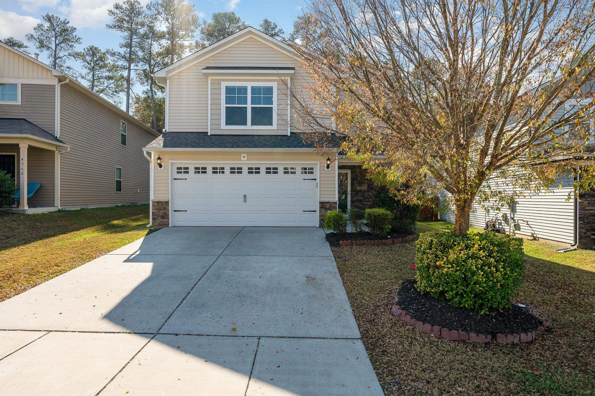 4364 Lyman Avenue Raleigh, NC 27616 - Photo 6 of 28 a view of a house with a garden