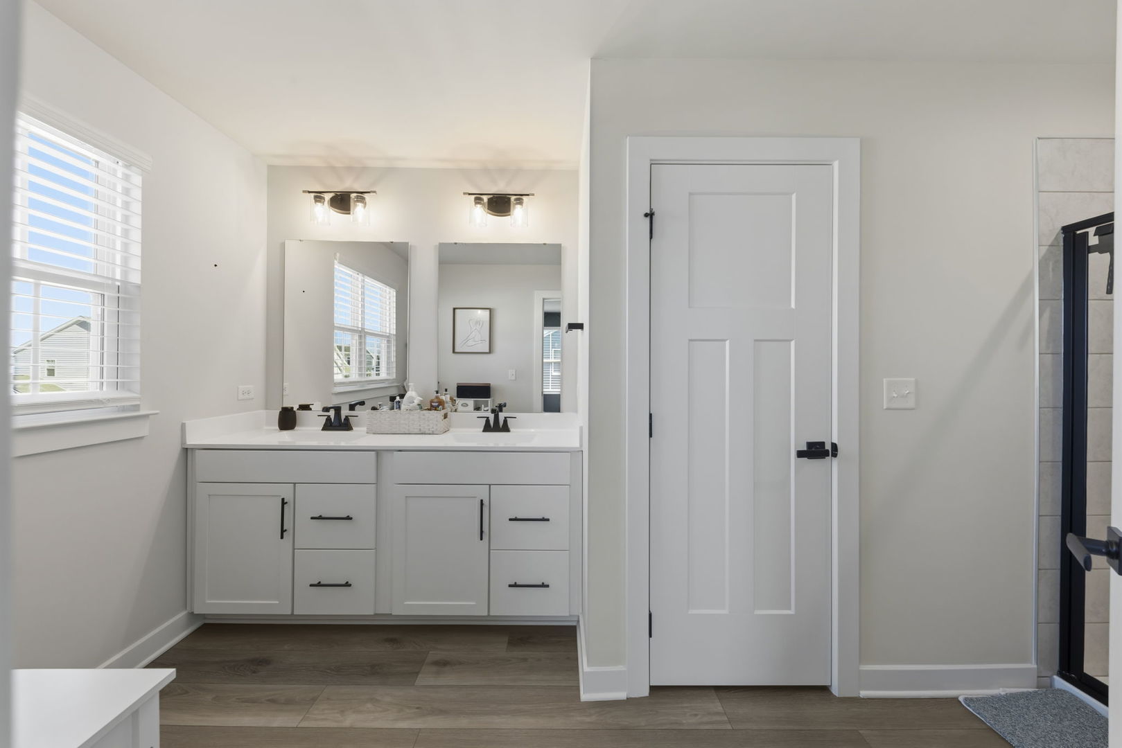319 Atkinson Drive Sugar Grove, IL 60554 - Photo 14 of 35 a spacious bathroom with a double vanity sink a mirror and a