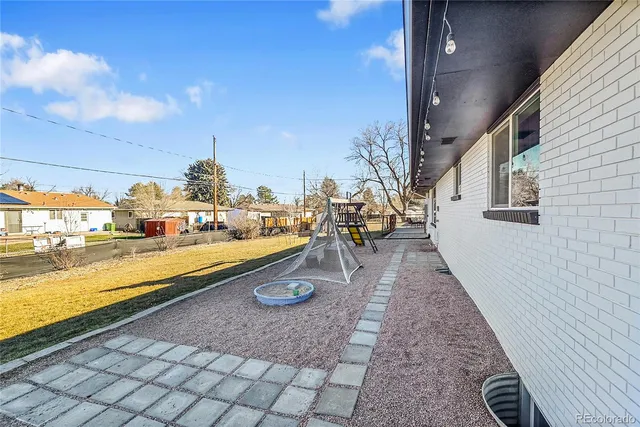 a view of swimming pool with outdoor seating