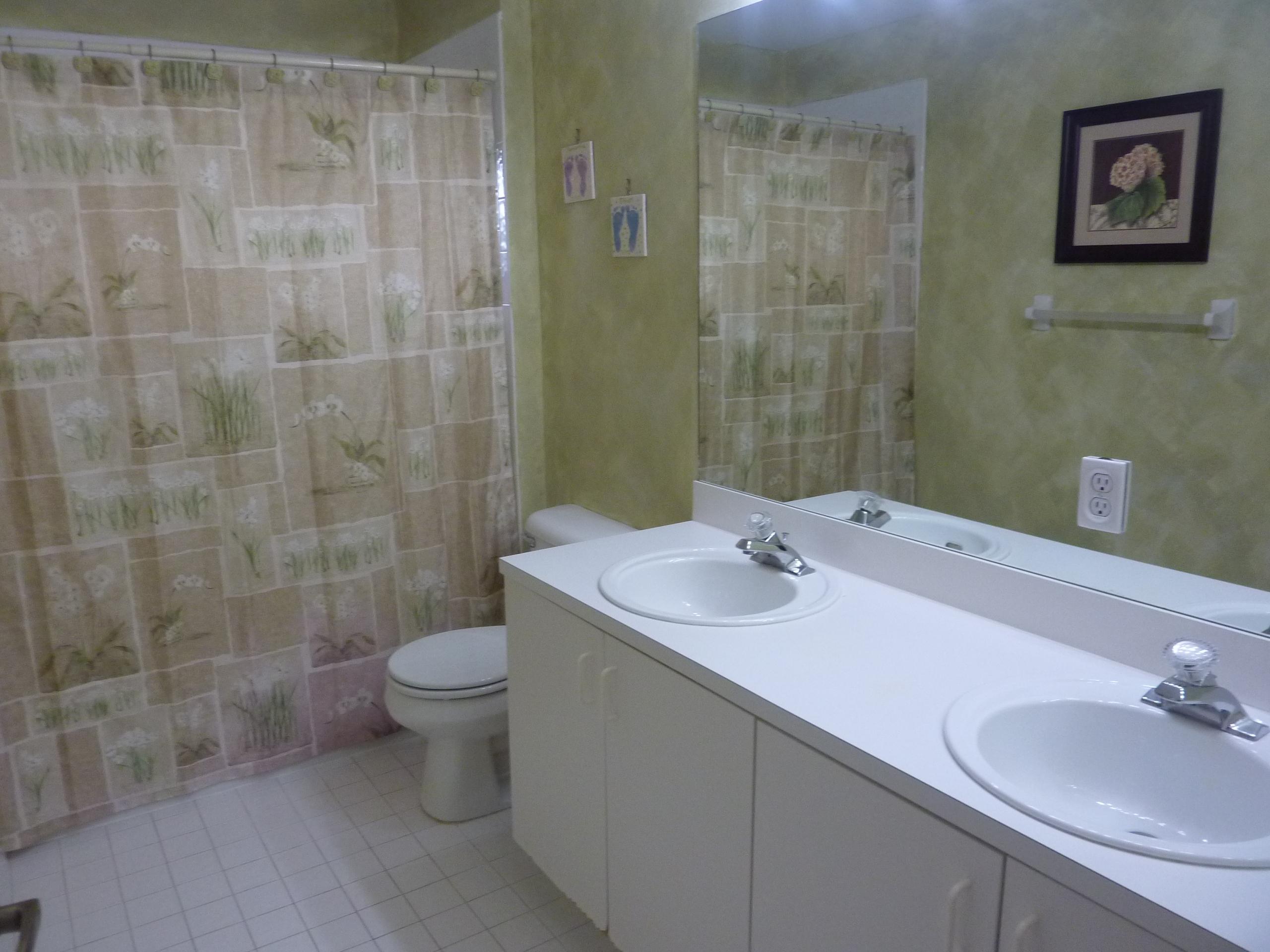 10988 Crescendo Circle Boca Raton, FL 33498 - Photo 21 of 41 Hallway Bathroom