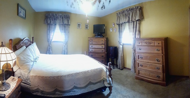 617 Stonegate Road New Lenox, IL 60451 - Photo 11 of 18 a bedroom with a bed and a dresser