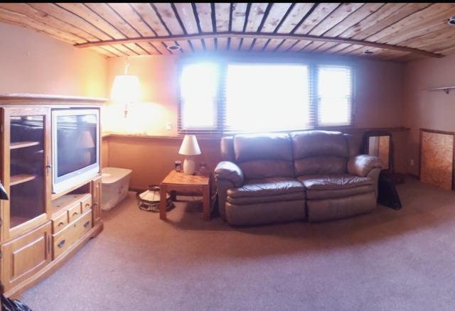 617 Stonegate Road New Lenox, IL 60451 - Photo 14 of 18 a living room with furniture and a chandelier