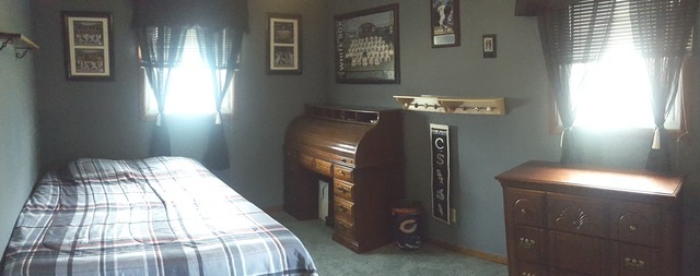 617 Stonegate Road New Lenox, IL 60451 - Photo 10 of 18 a bedroom with a bed and a chandelier
