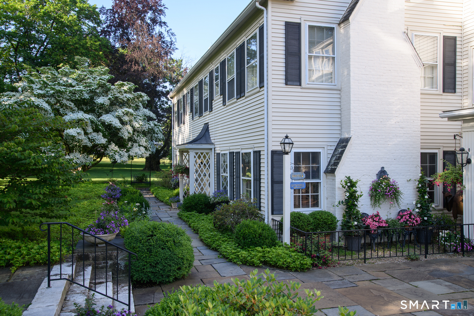 1 Great Elm Road Sharon, CT 06069 - Photo 7 of 39 Manicured gardens and pathways throughout the grounds add to the luxurious feeling of this storied property.