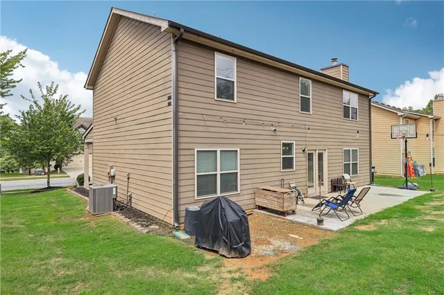 a view of a backyard with furniture