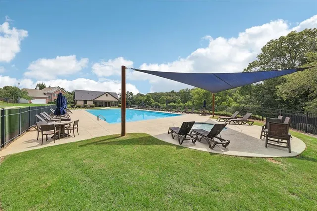 a view of a garden with sitting area