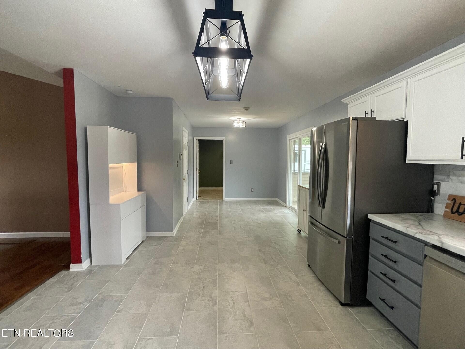 5409 Old Niles Ferry Road Maryville, TN 37801 - Photo 12 of 43 a kitchen with stainless steel appliances a refrigerator and microwave