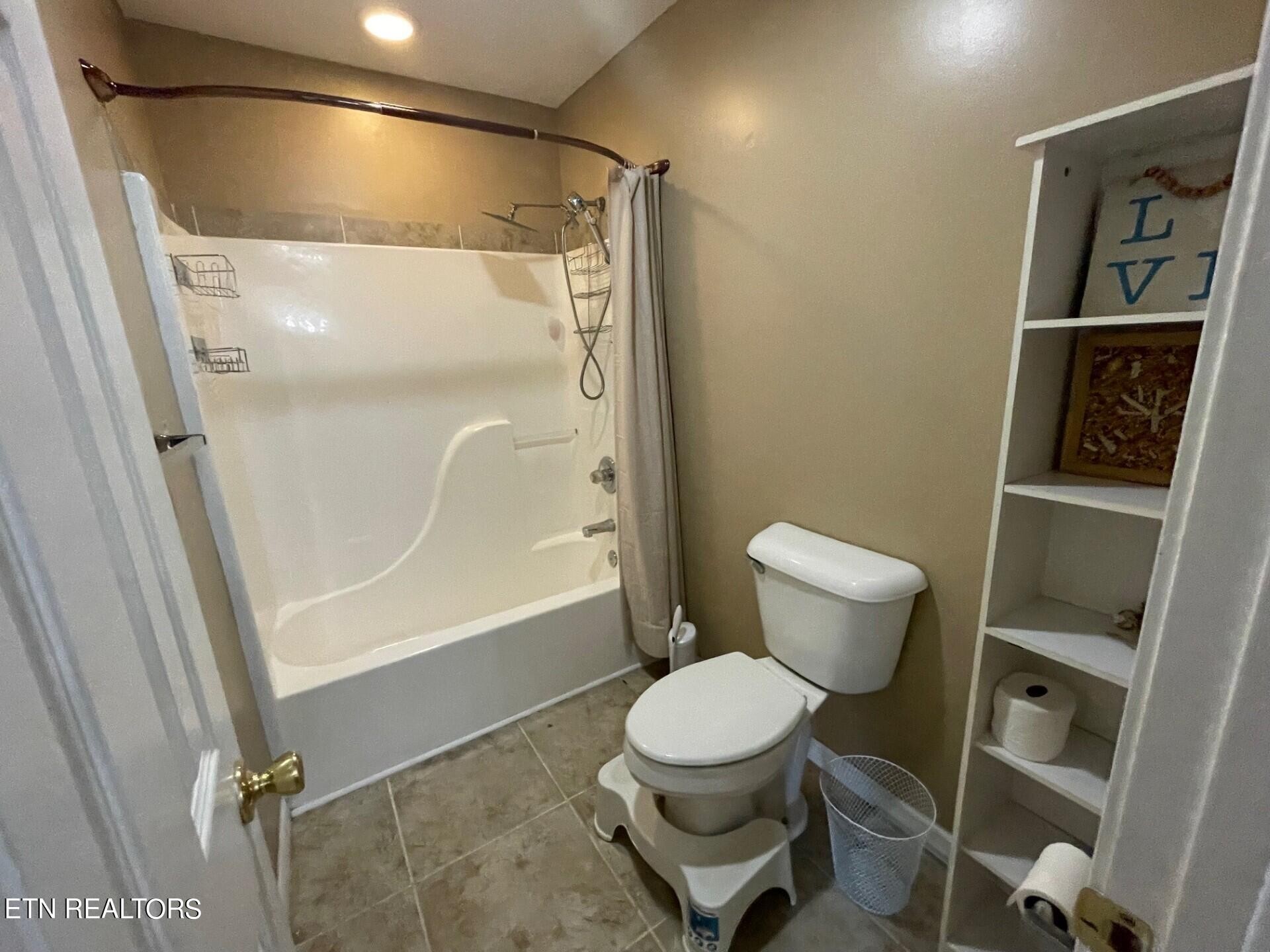 5409 Old Niles Ferry Road Maryville, TN 37801 - Photo 20 of 43 a bathroom with a toilet and a shower