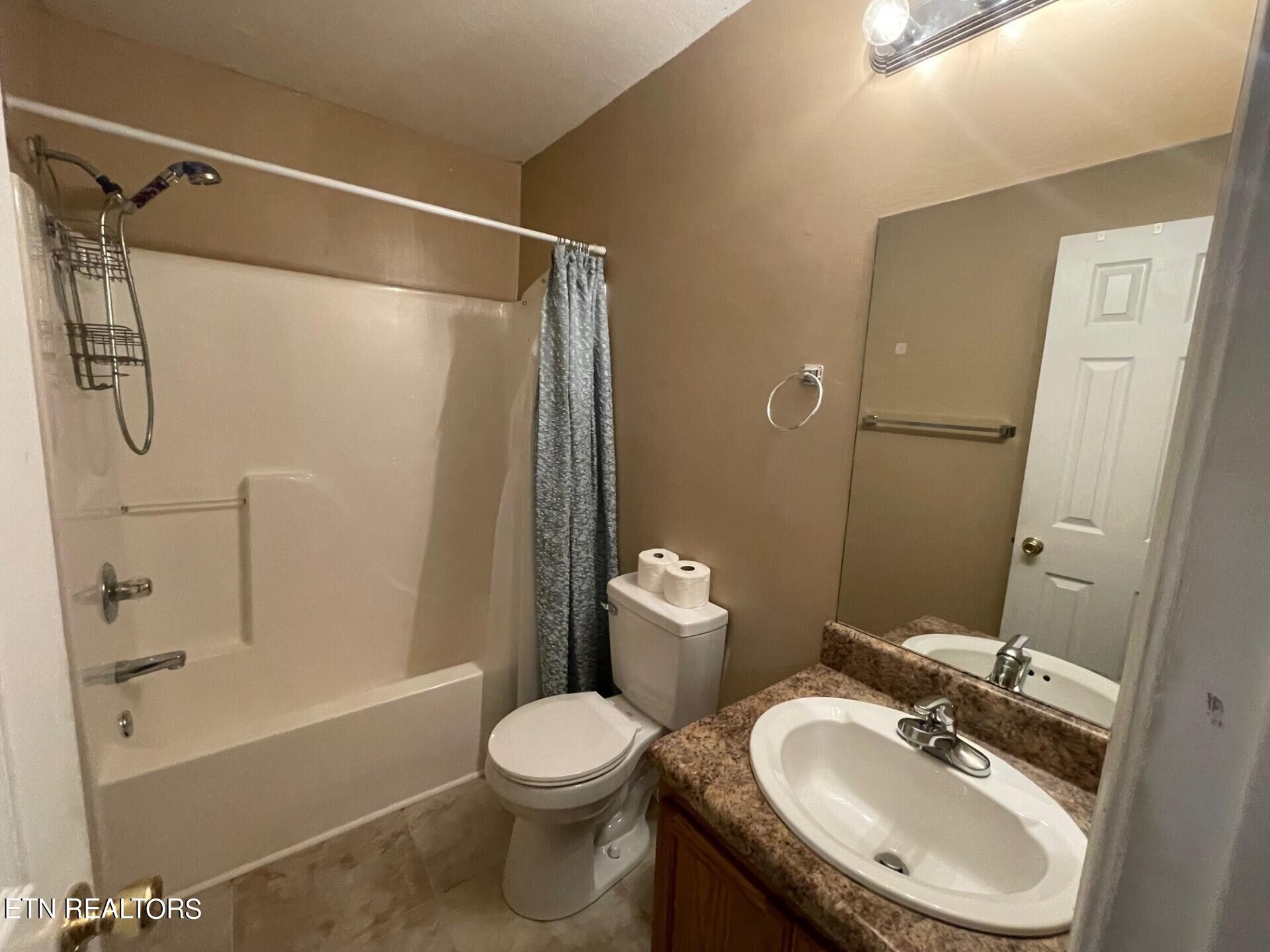 5409 Old Niles Ferry Road Maryville, TN 37801 - Photo 27 of 43 a bathroom with a sink toilet and shower