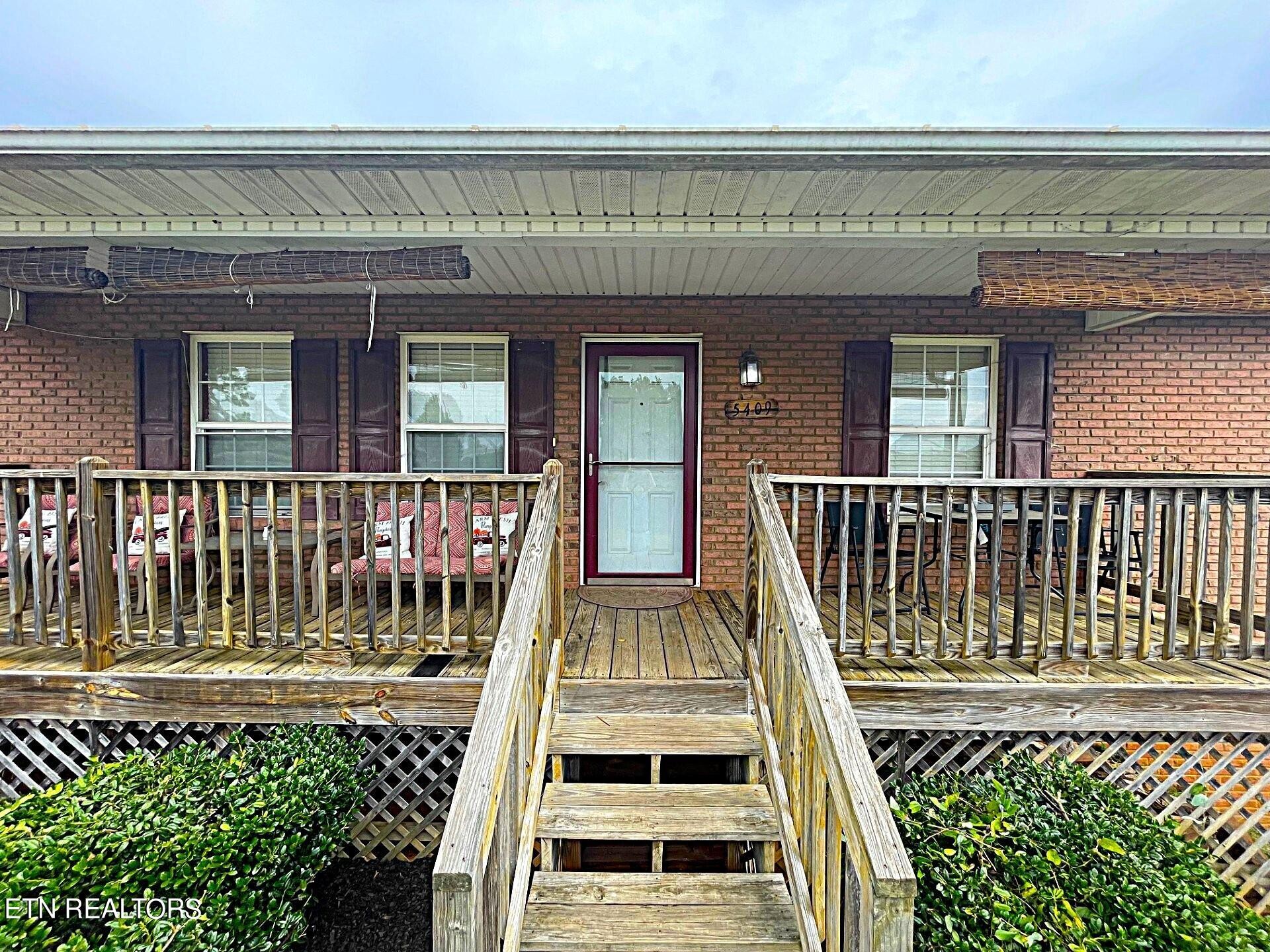 5409 Old Niles Ferry Road Maryville, TN 37801 - Photo 4 of 43 front view of a house with a porch