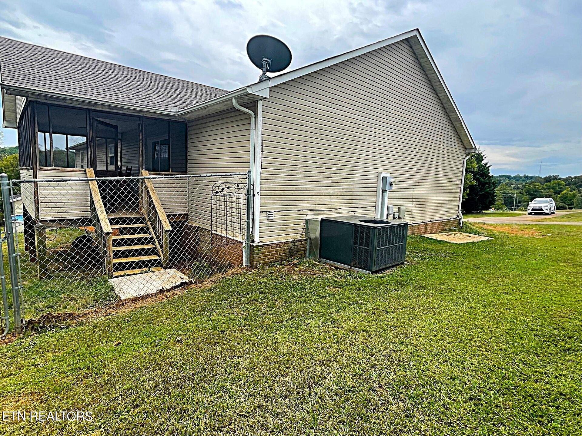 5409 Old Niles Ferry Road Maryville, TN 37801 - Photo 42 of 43 a house view with a backyard space