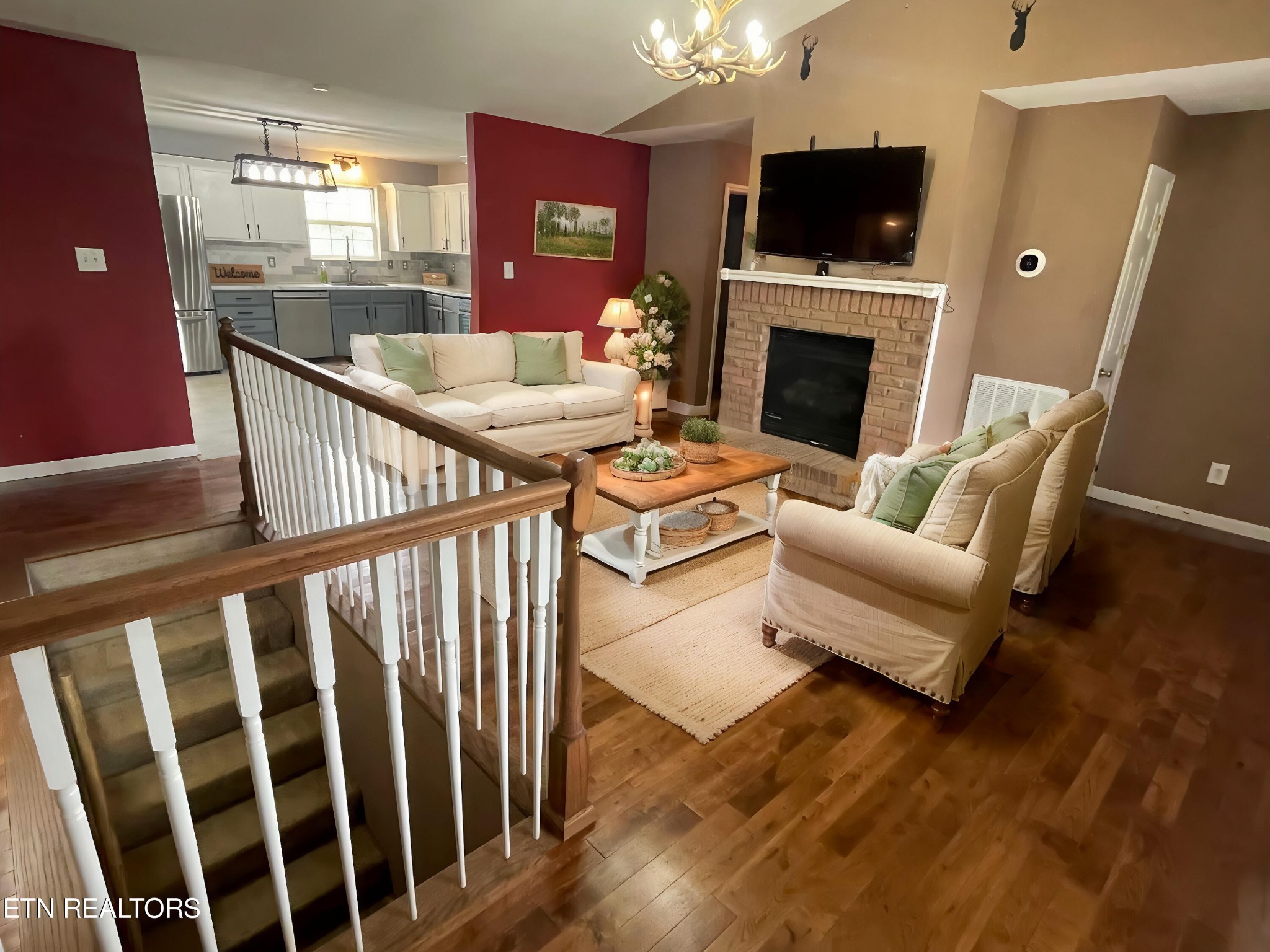 5409 Old Niles Ferry Road Maryville, TN 37801 - Photo 6 of 43 a living room with furniture fireplace and flat screen tv