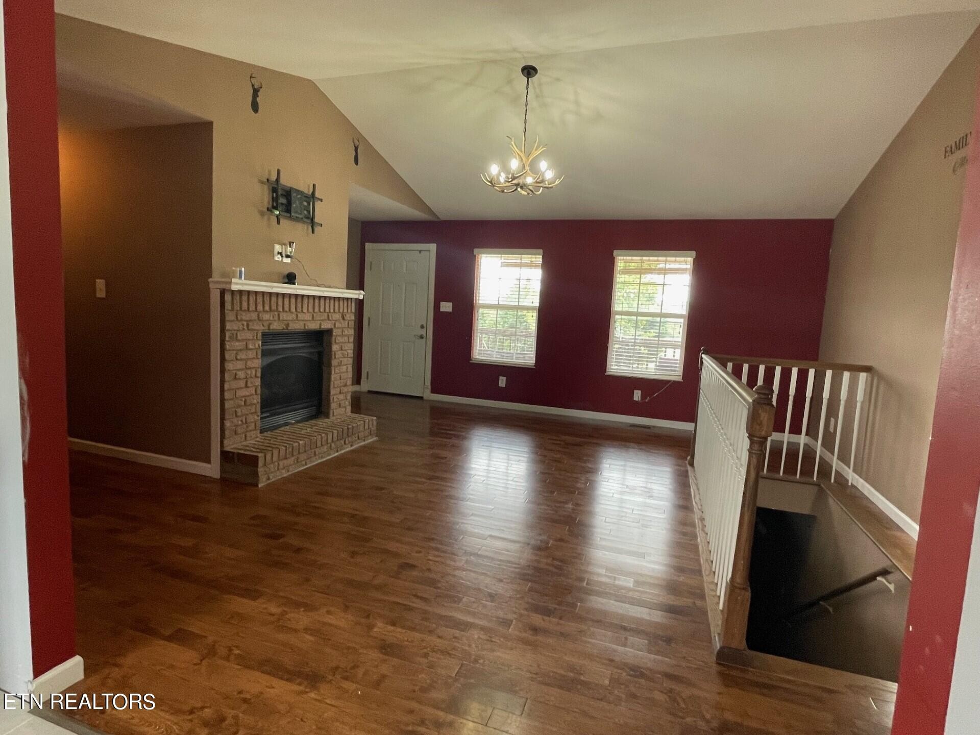 5409 Old Niles Ferry Road Maryville, TN 37801 - Photo 8 of 43 an entryway with a livingroom wooden floor and fireplace